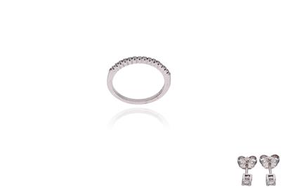 Parure orecchini e anello con diamanti - Asta Preziosi Parure orecchini e anello con diamanti - Asta Preziosi