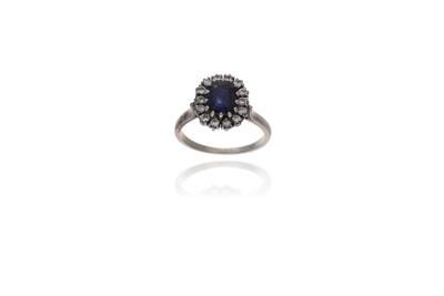 Anello con zaffiro e diamanti - Asta Preziosi Anello con zaffiro e diamanti - Asta Preziosi