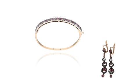 Bracciale e orecchini con diamanti e rubini - Asta Preziosi