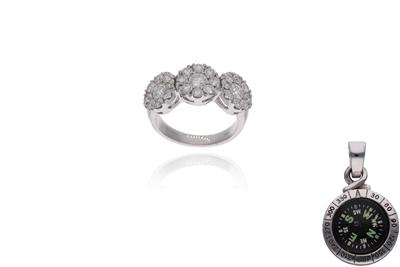 Anello con diamanti e ciondolo Giovepluvio - Asta Preziosi Anello con diamanti e ciondolo Giovepluvio - Asta Preziosi