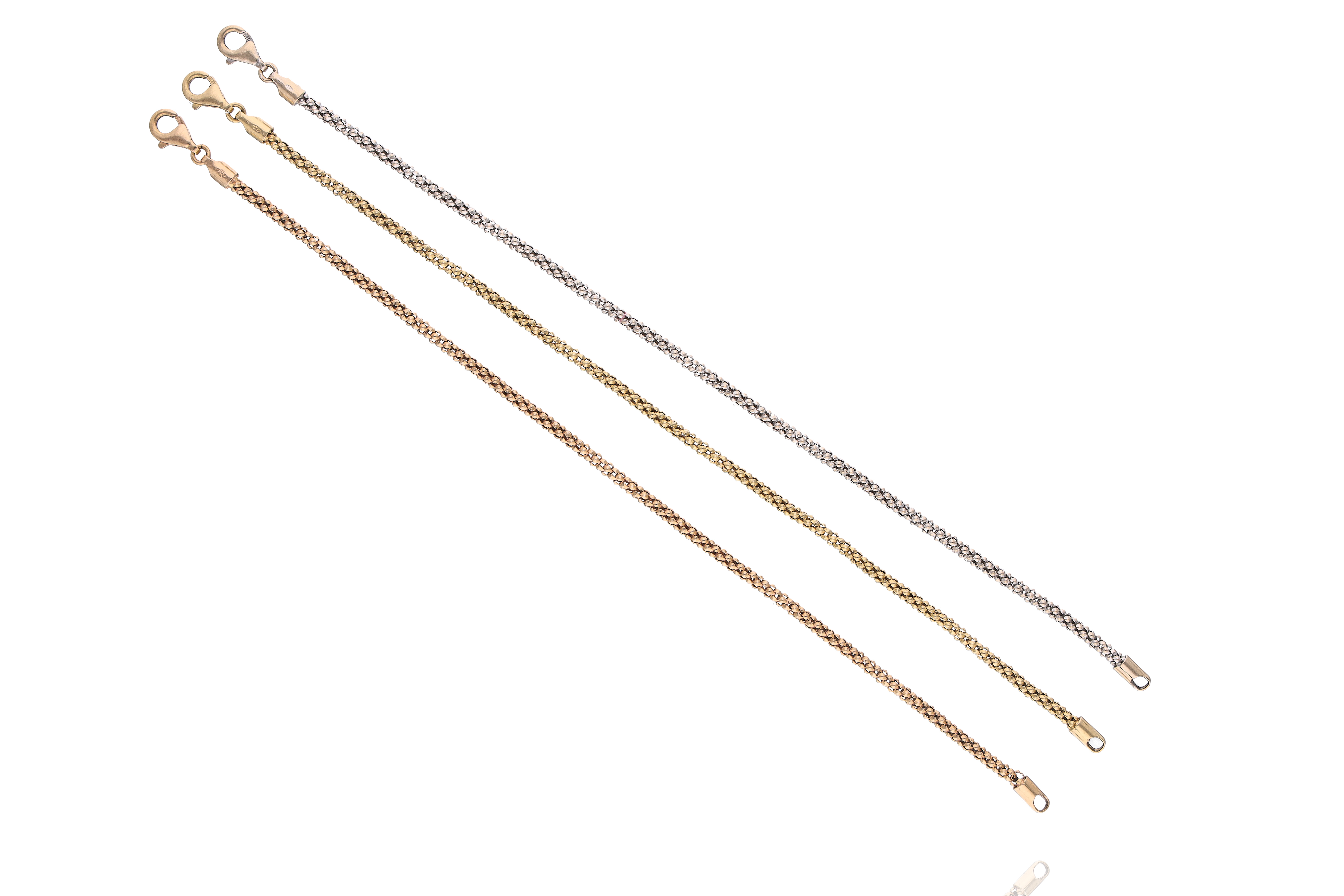 Tre bracciali in oro - Asta Preziosi