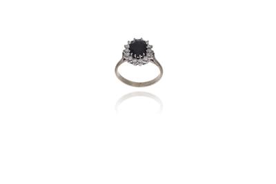 Anello con diamanti e zaffiro - Asta Preziosi Anello con diamanti e zaffiro - Asta Preziosi