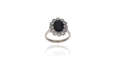 Anello con zaffiro e diamanti - Asta Preziosi Anello con zaffiro e diamanti - Asta Preziosi