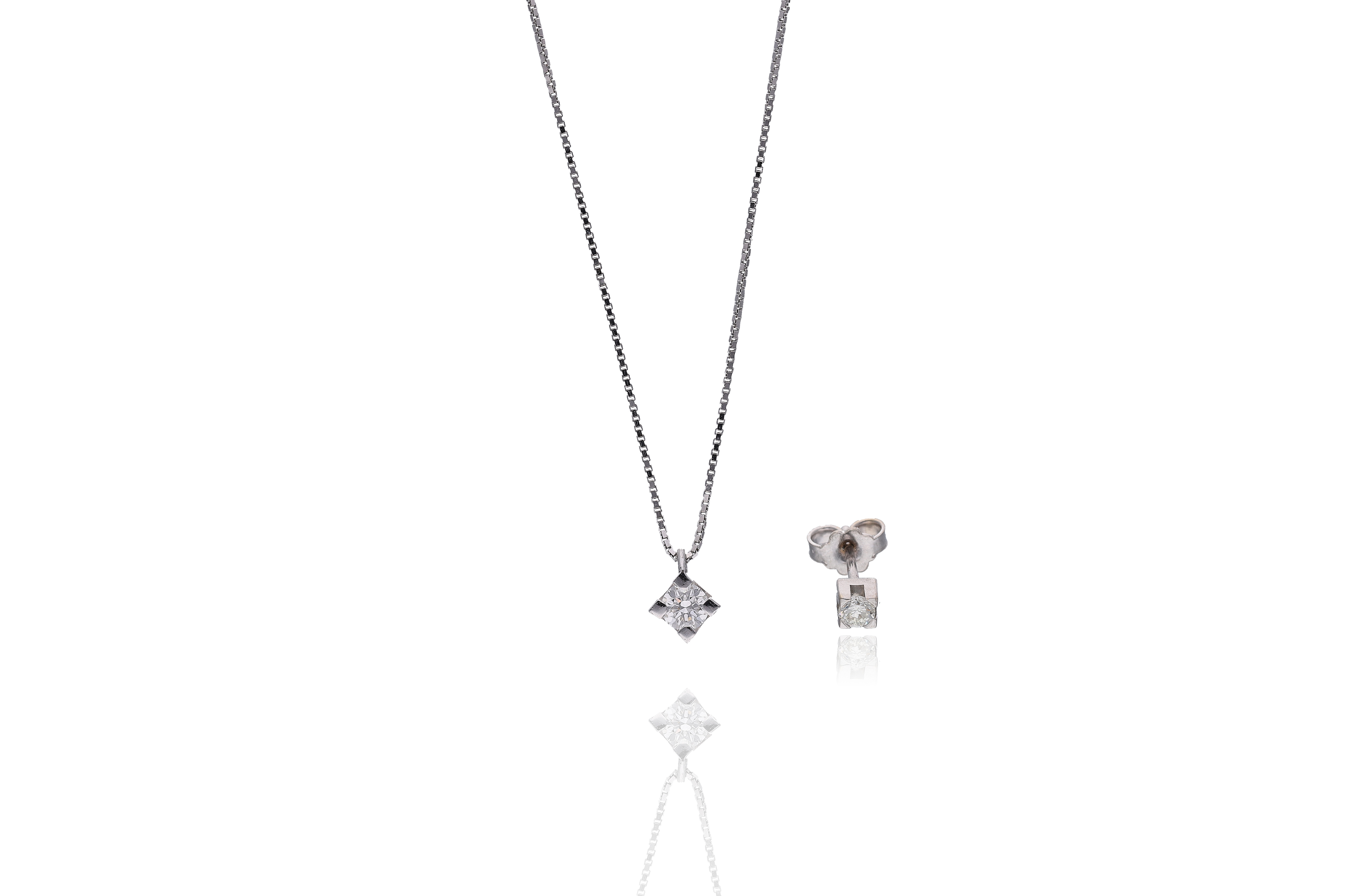 Collana con pendente e orecchino con diamanti - Asta Preziosi