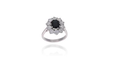 Anello con diamanti e zaffiro - Asta Preziosi Anello con diamanti e zaffiro - Asta Preziosi