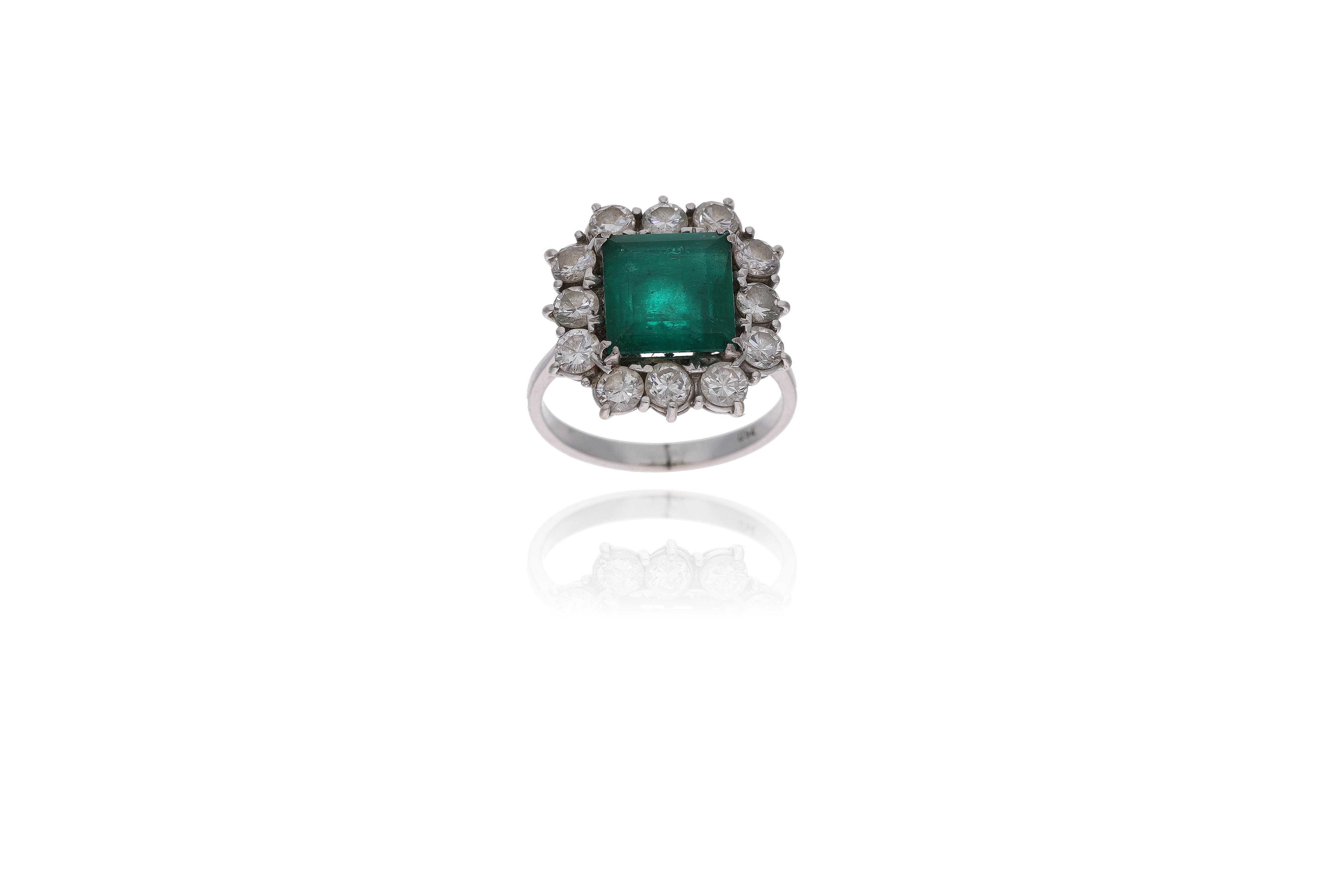 Anello con diamanti e smeraldo - Asta Preziosi