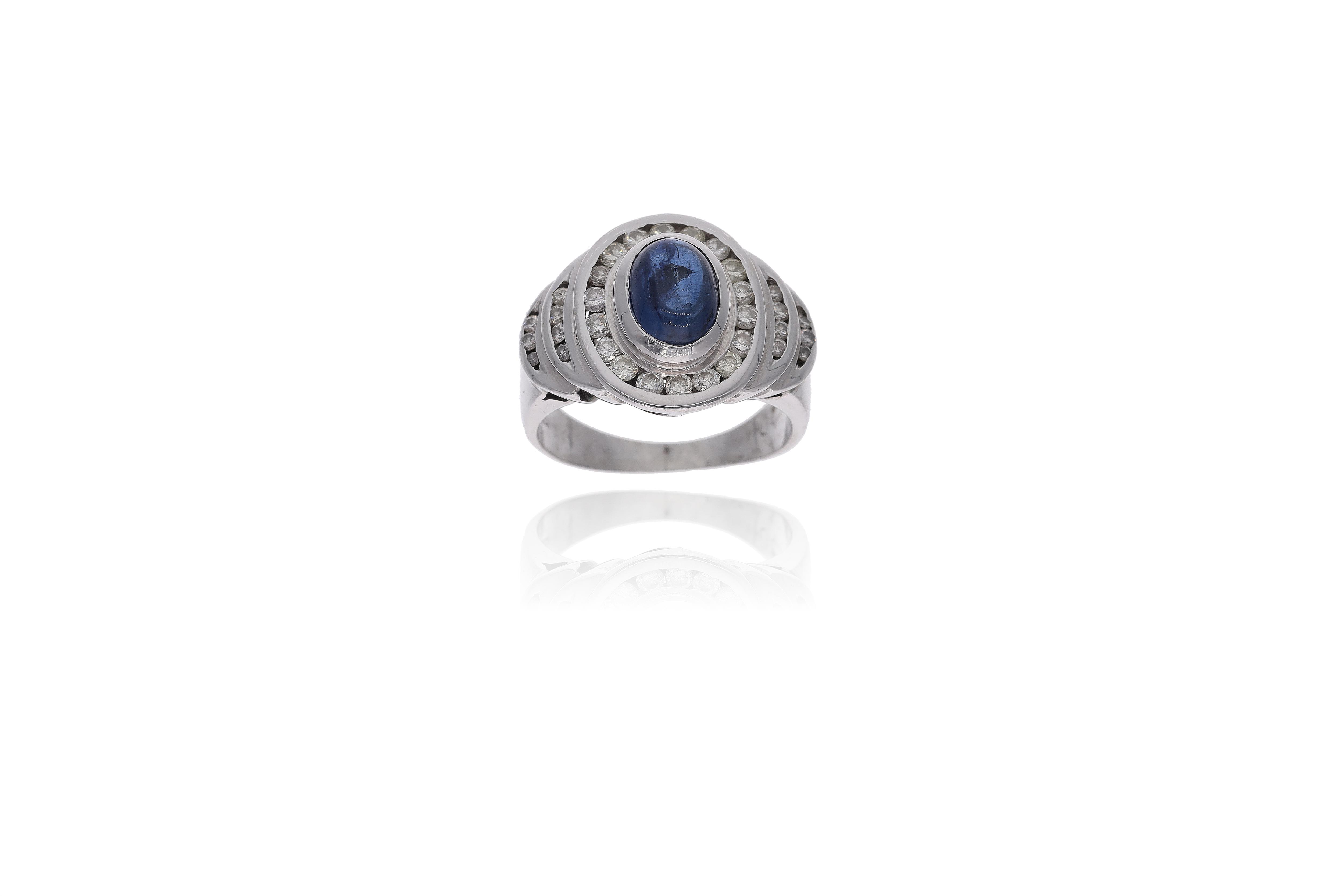 Anello con pietra e diamanti - Asta Preziosi