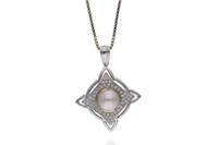 Collana con ciondolo e anello con pietre e perle - Asta Preziosi Collana con ciondolo e anello con pietre e perle - Asta Preziosi