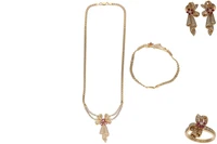 Parure collana, bracciale, anello e orecchini - Asta Preziosi Parure collana, bracciale, anello e orecchini - Asta Preziosi