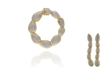 Parure bracciale e paio di orecchini con diamanti - Asta Preziosi Parure bracciale e paio di orecchini con diamanti - Asta Preziosi