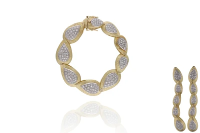 Parure bracciale e paio di orecchini con diamanti - Asta Preziosi Parure bracciale e paio di orecchini con diamanti - Asta Preziosi
