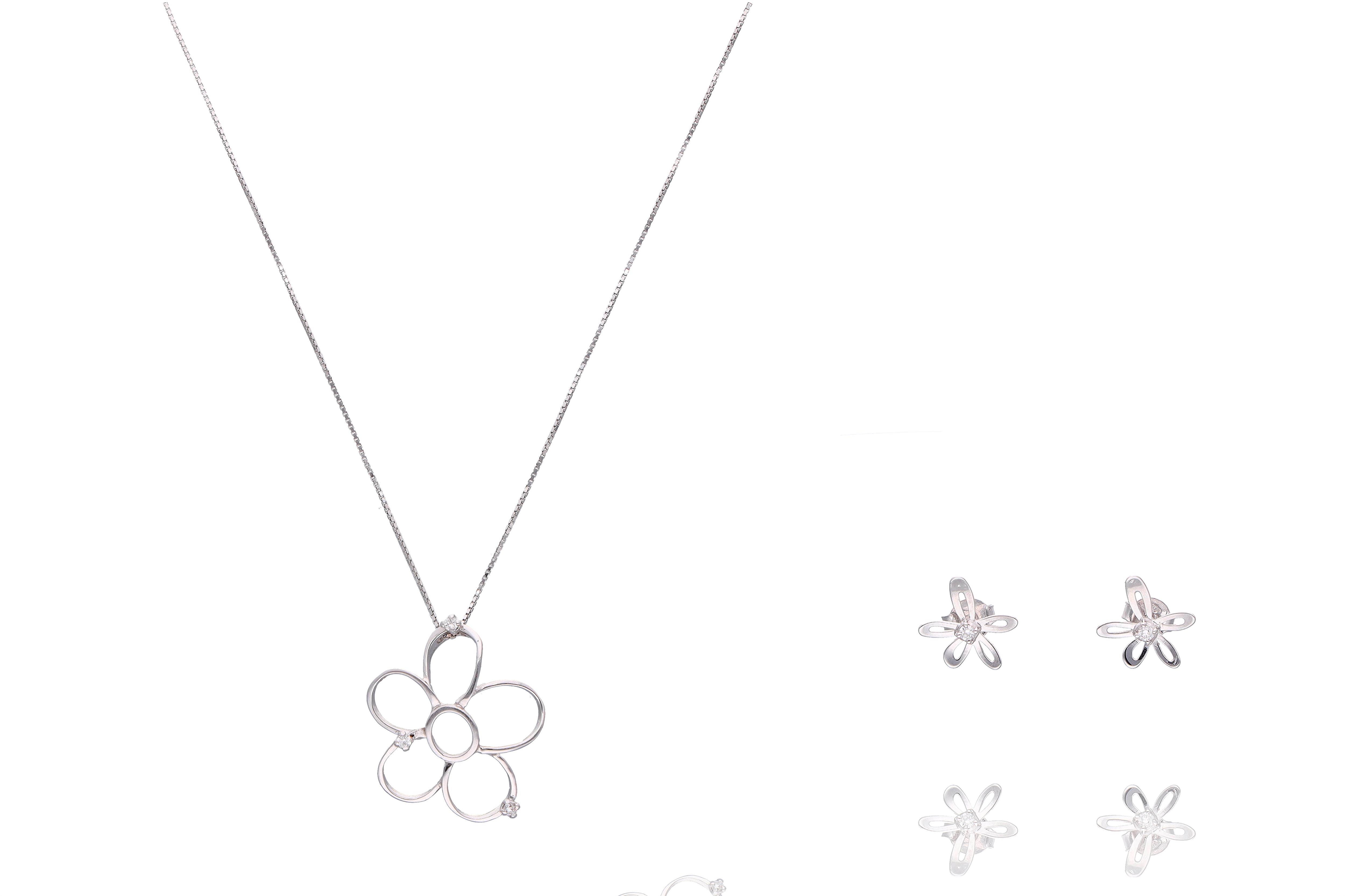 Collana con pendente e orecchini con diamanti - Asta preziosi