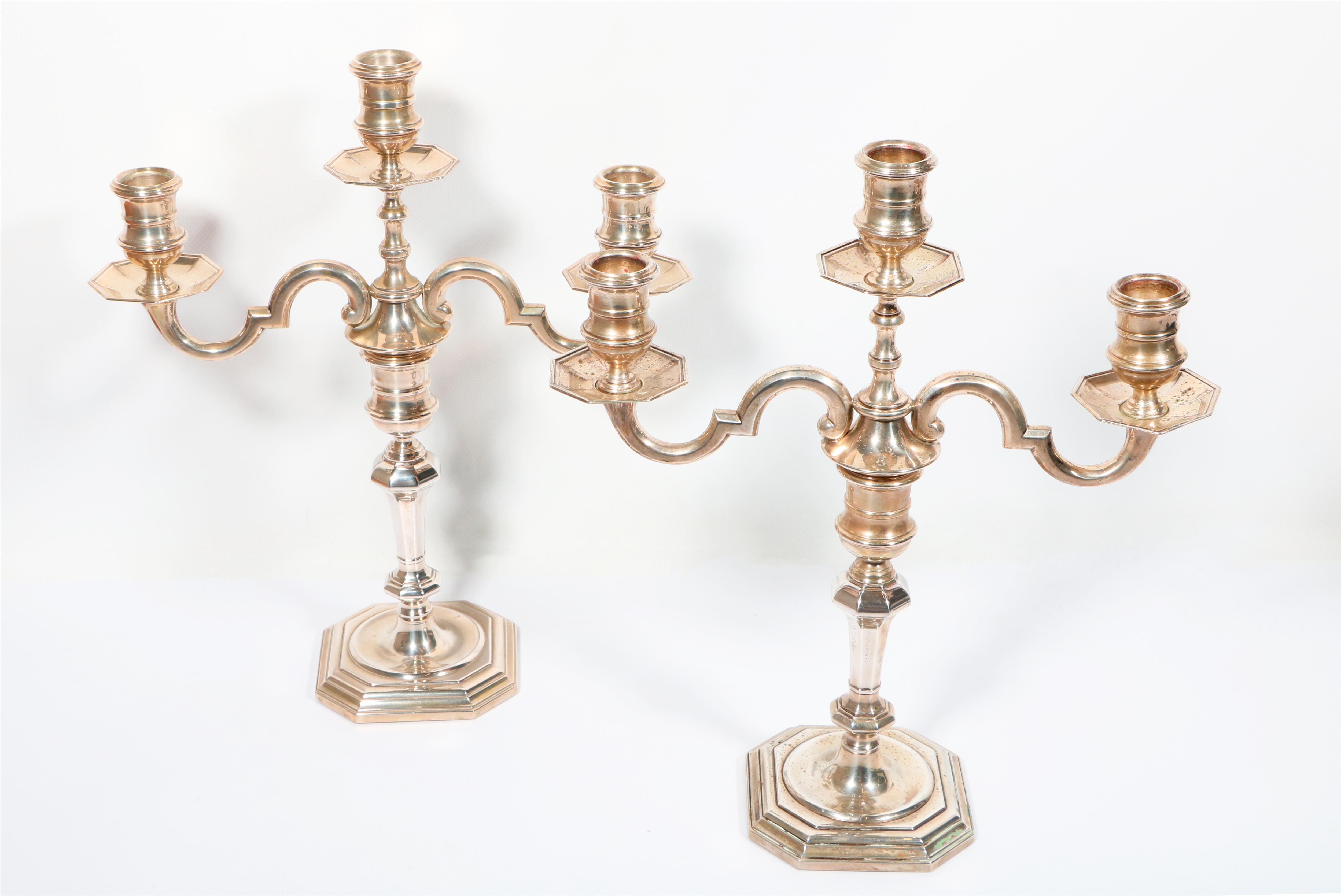 Coppia di candelabri in argento - Asta preziosi