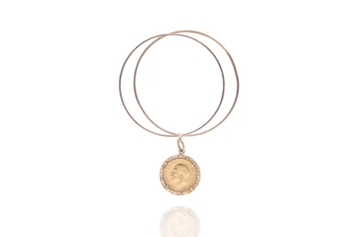 Bracciale con sterlina - Asta Preziosi Bracciale con sterlina - Asta Preziosi
