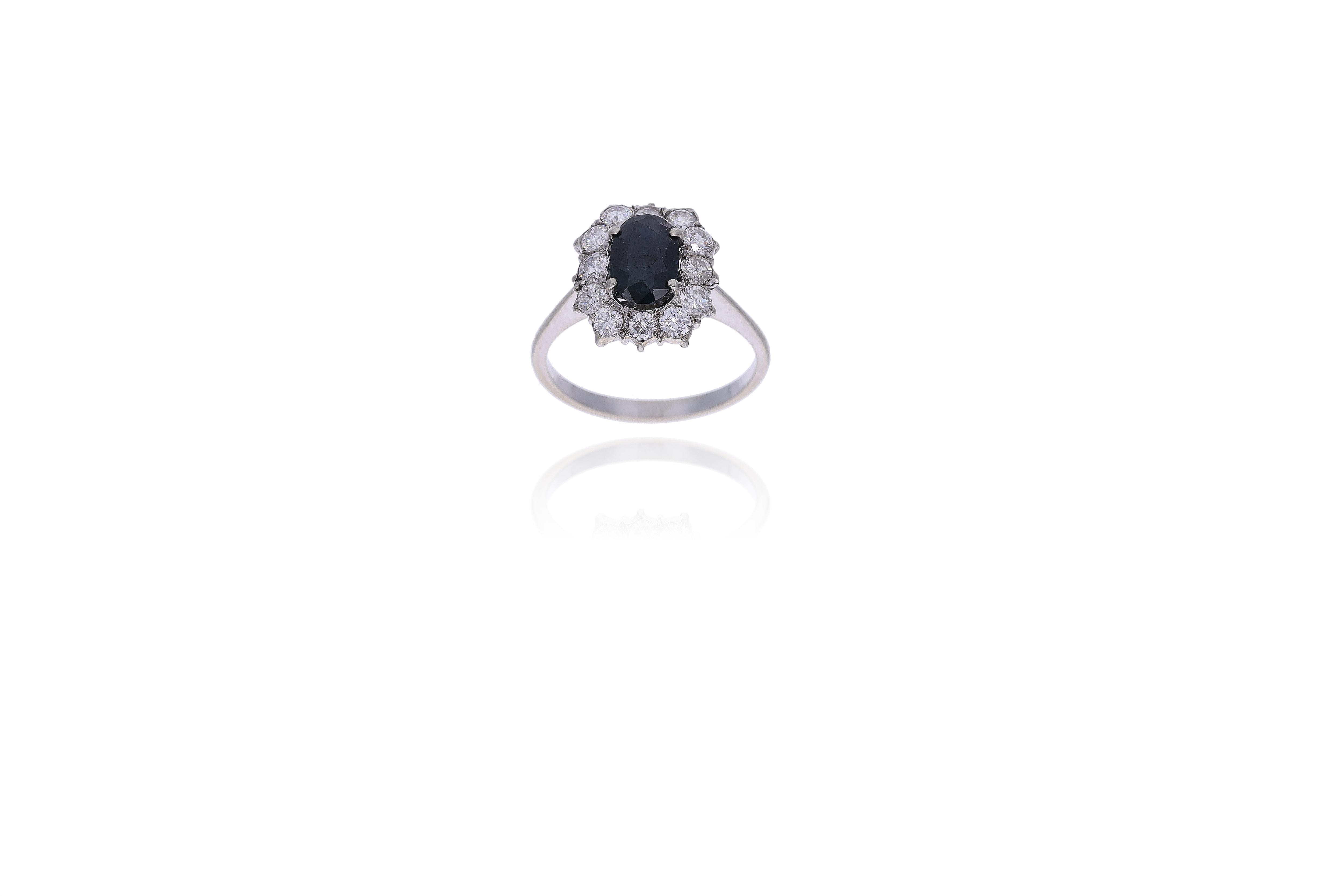 Anello con diamanti e zaffiro - Asta Preziosi