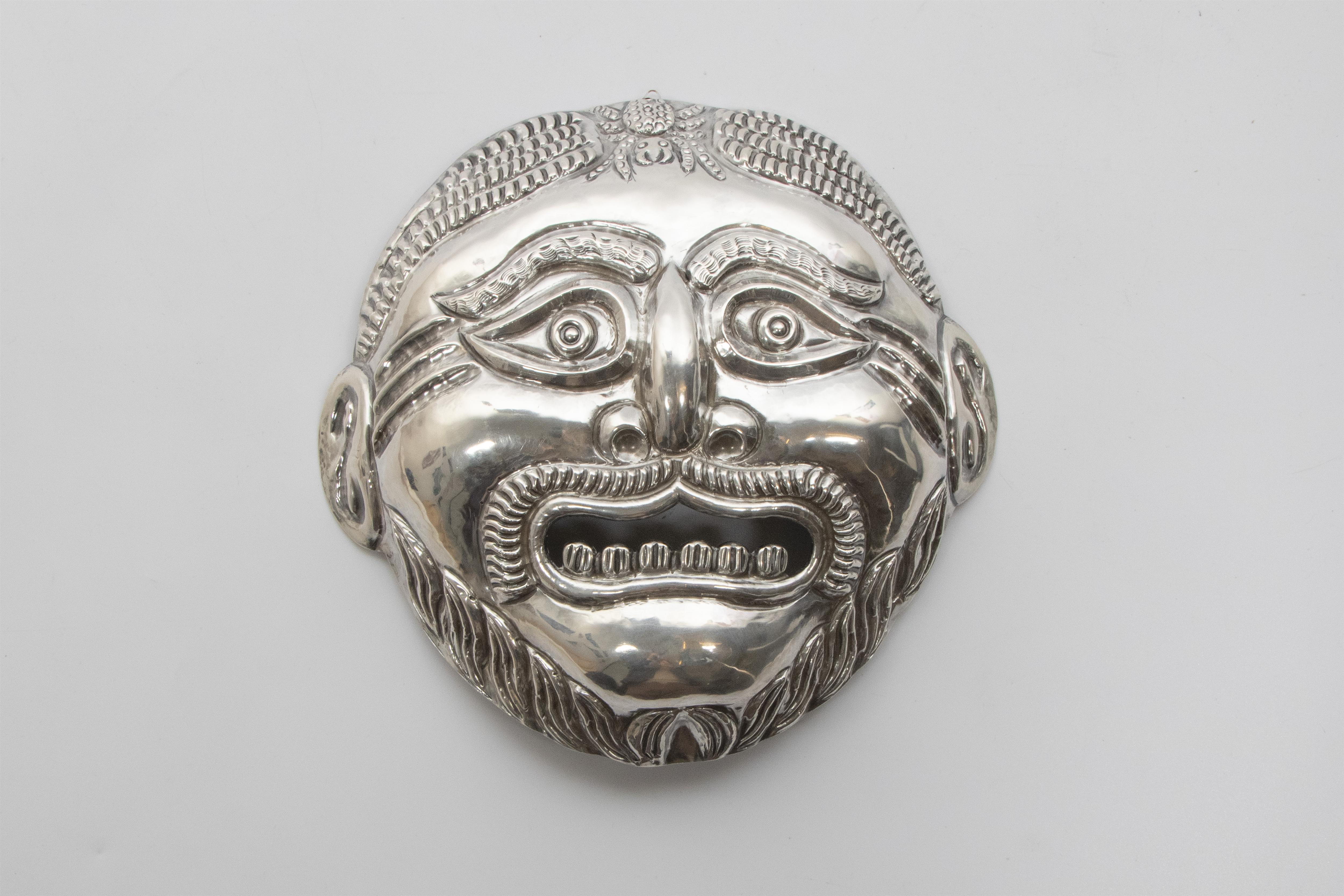 Maschera in argento - Asta Preziosi