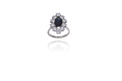 Anello con diamanti e zaffiro - Asta Preziosi Anello con diamanti e zaffiro - Asta Preziosi