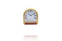 Cartier, sveglia da tavolo in metallo placcato oro - Asta Preziosi Cartier, sveglia da tavolo in metallo placcato oro - Asta Preziosi