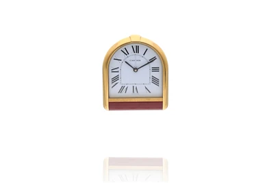 Cartier, sveglia da tavolo in metallo placcato oro - Asta Preziosi Cartier, sveglia da tavolo in metallo placcato oro - Asta Preziosi