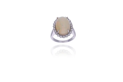 Anello con diamanti e pietra - Asta Preziosi Anello con diamanti e pietra - Asta Preziosi