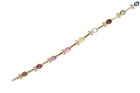 Bracciale con acquamarina, ametista, quarzi, tormaline e granato - Asta Preziosi Bracciale con acquamarina, ametista, quarzi, tormaline e granato - Asta Preziosi