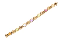 Bracciale con granati, acquamarina, peridoti, quarzi e ametista - Asta Preziosi Bracciale con granati, acquamarina, peridoti, quarzi e ametista - Asta Preziosi