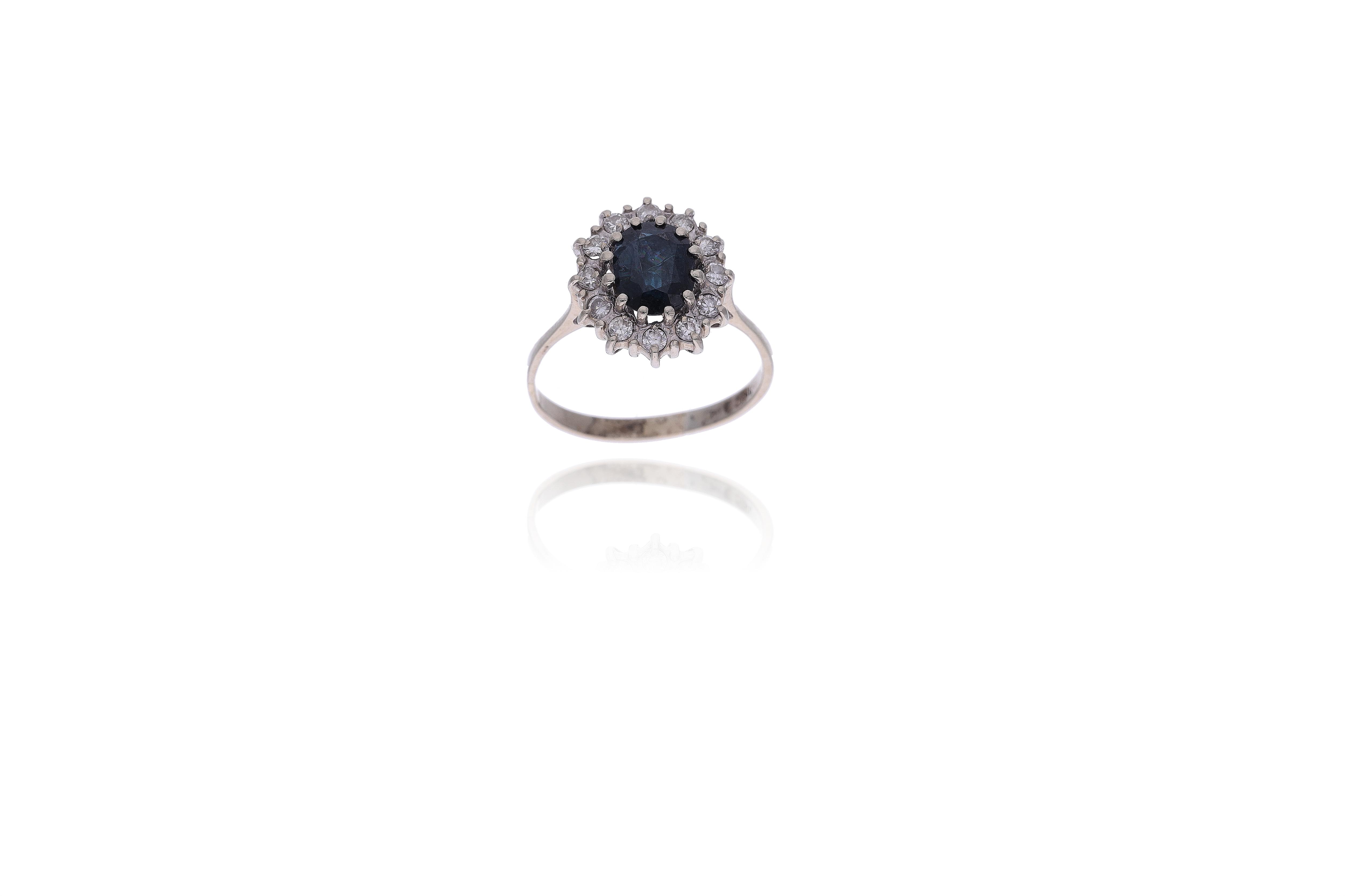 Anello con diamanti e pietra - Asta Preziosi