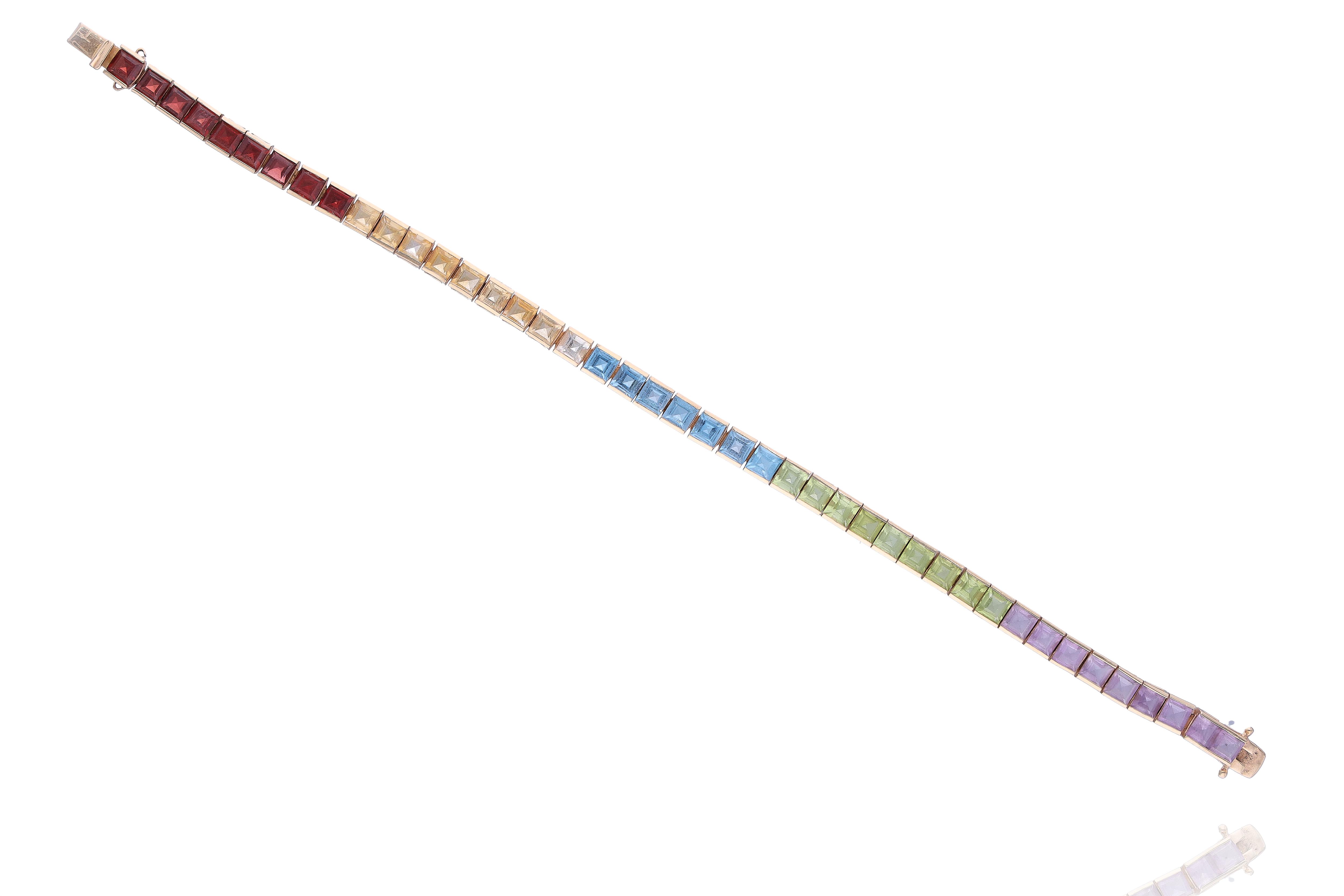 Bracciale con ametiste, peridoti, topazi azzurri, quarzi e granati - Asta Preziosi