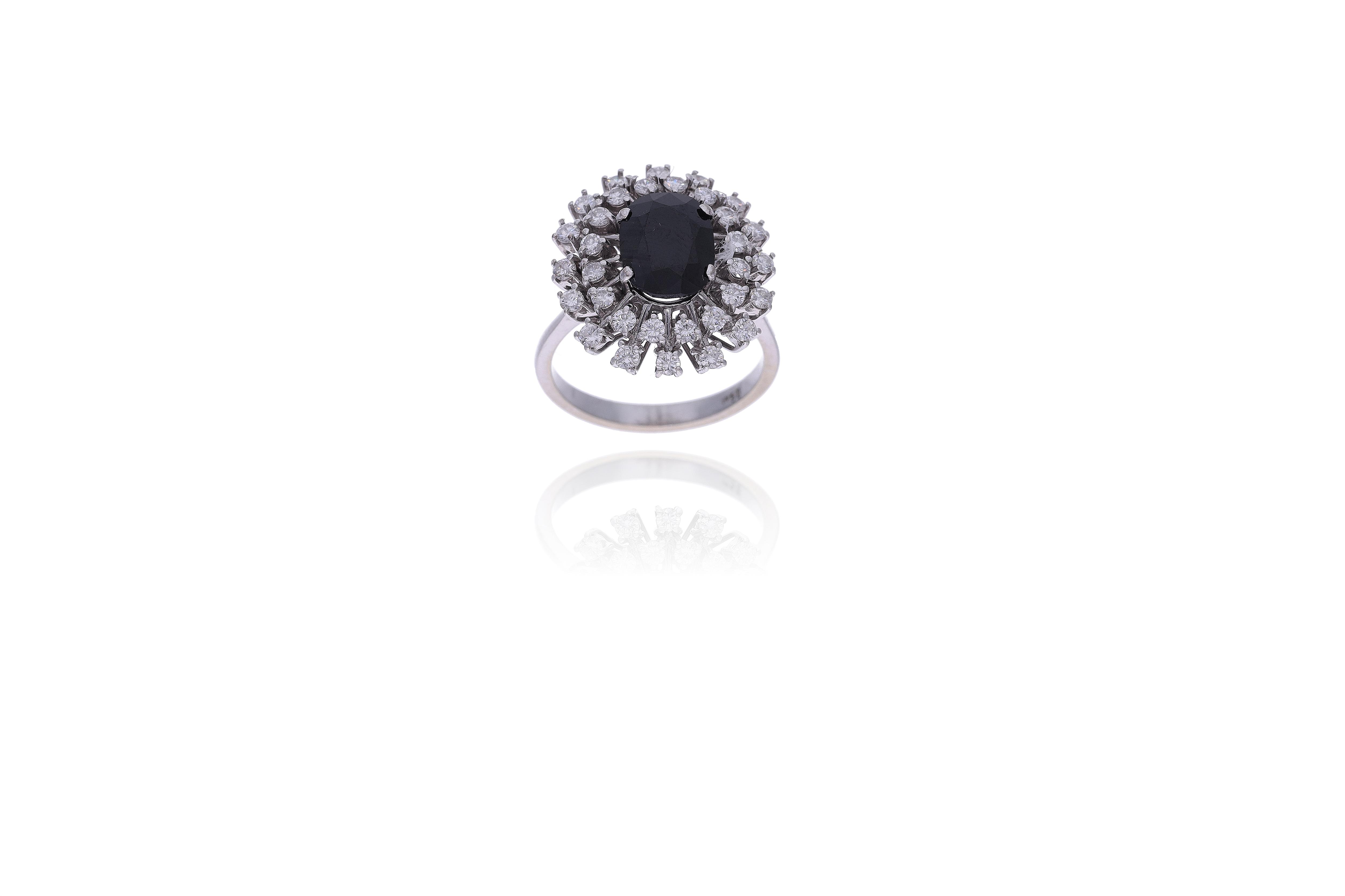 Anello con diamanti e zaffiro - Asta Preziosi