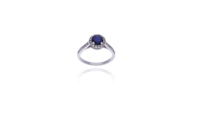 Anello con diamanti e pietra - Asta Preziosi Anello con diamanti e pietra - Asta Preziosi