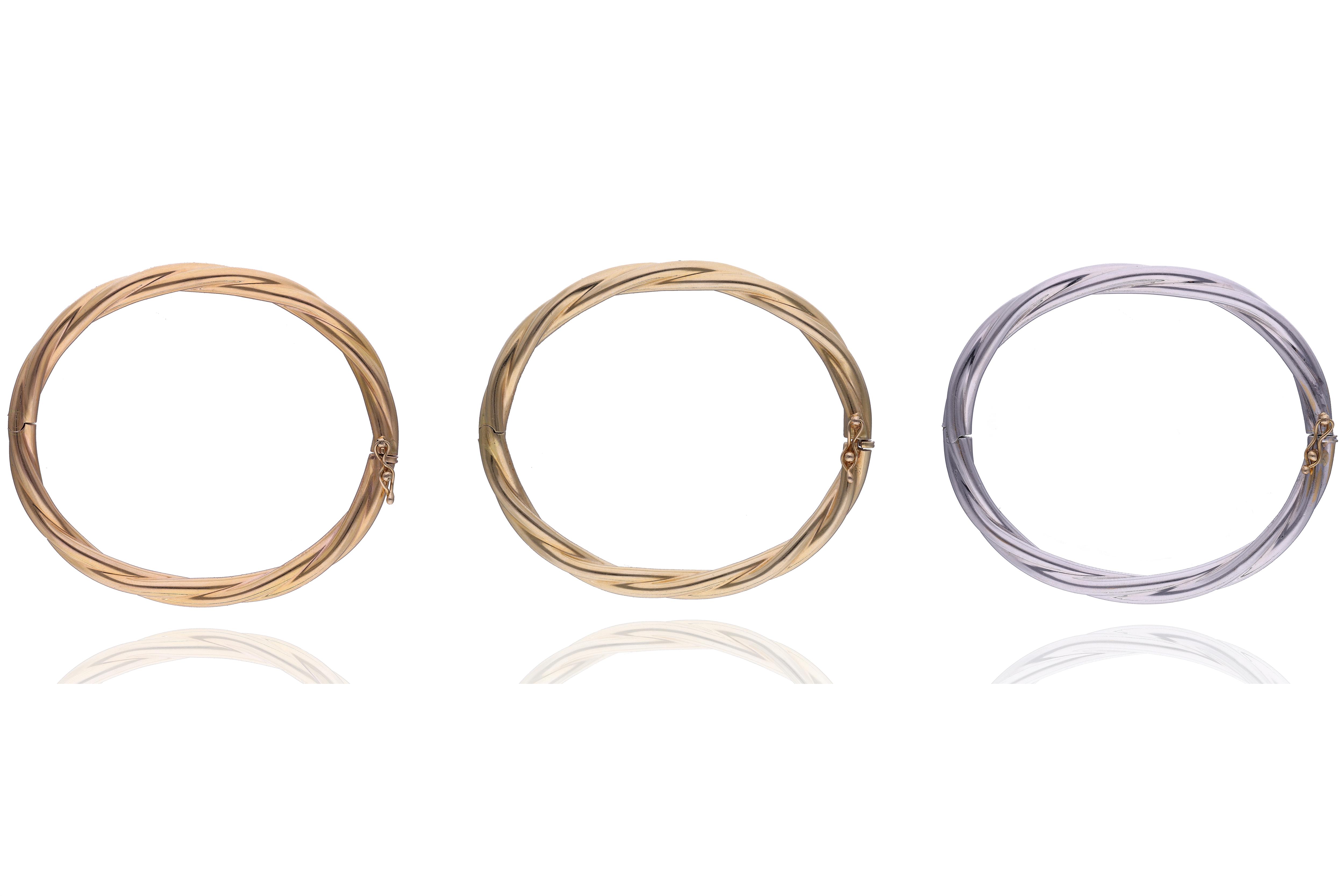 Tre bracciali in oro - Asta Preziosi