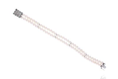 Bracciale con perle coltivate e smeraldi - Asta Preziosi Bracciale con perle coltivate e smeraldi - Asta Preziosi