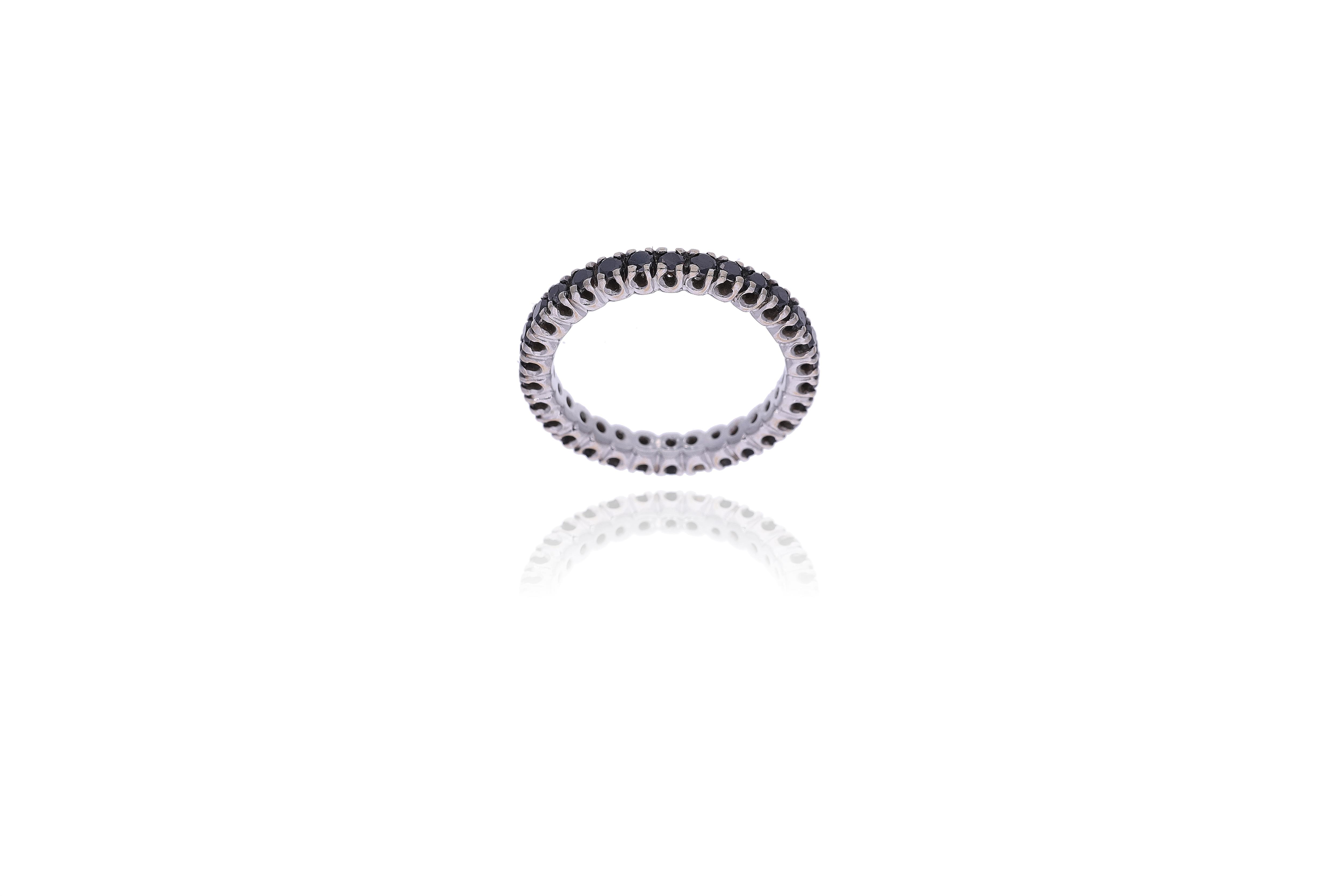 Anello con diamante e diamanti neri - Asta Preziosi