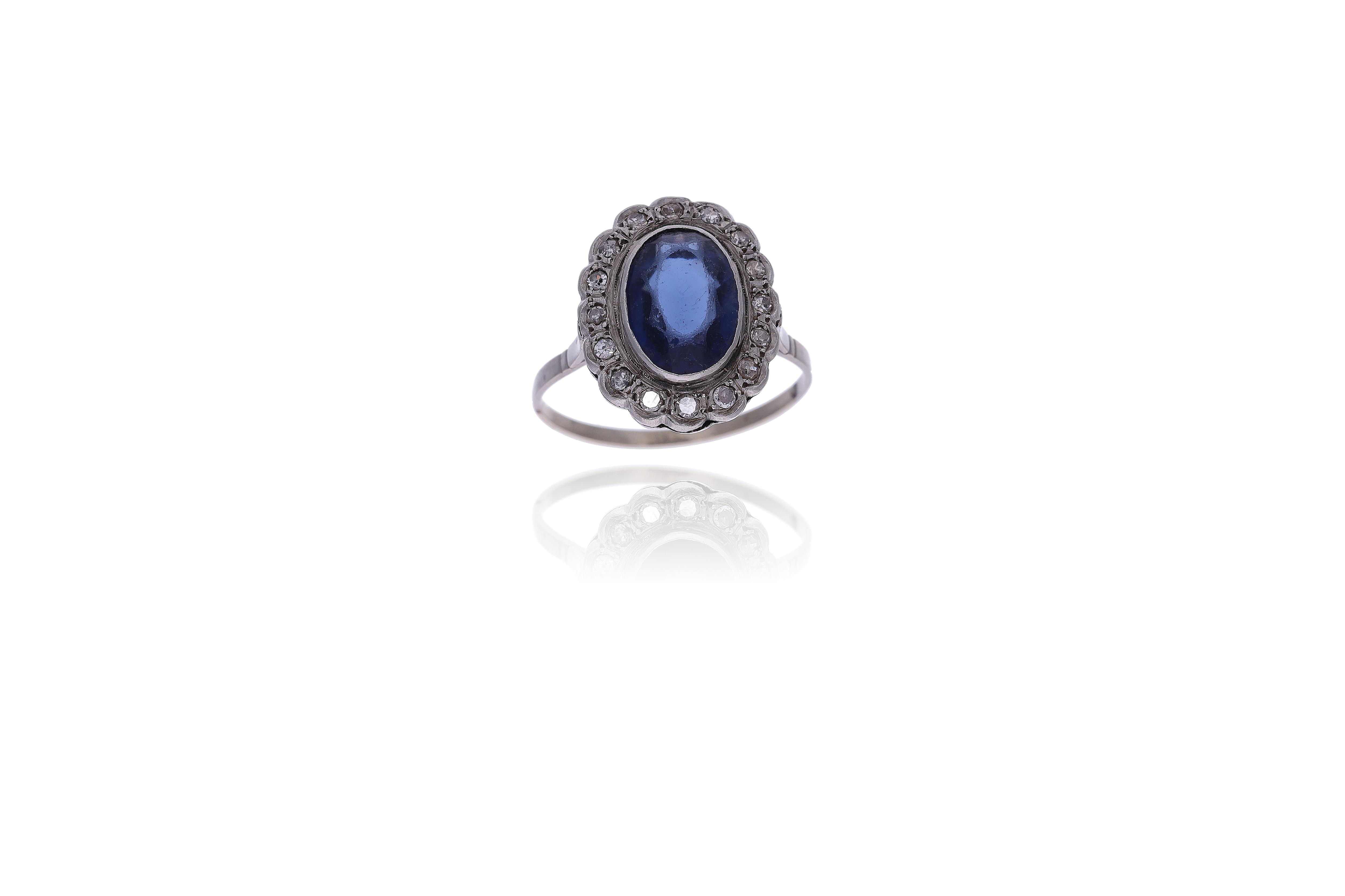 Anello con diamanti e pietra - Asta Preziosi