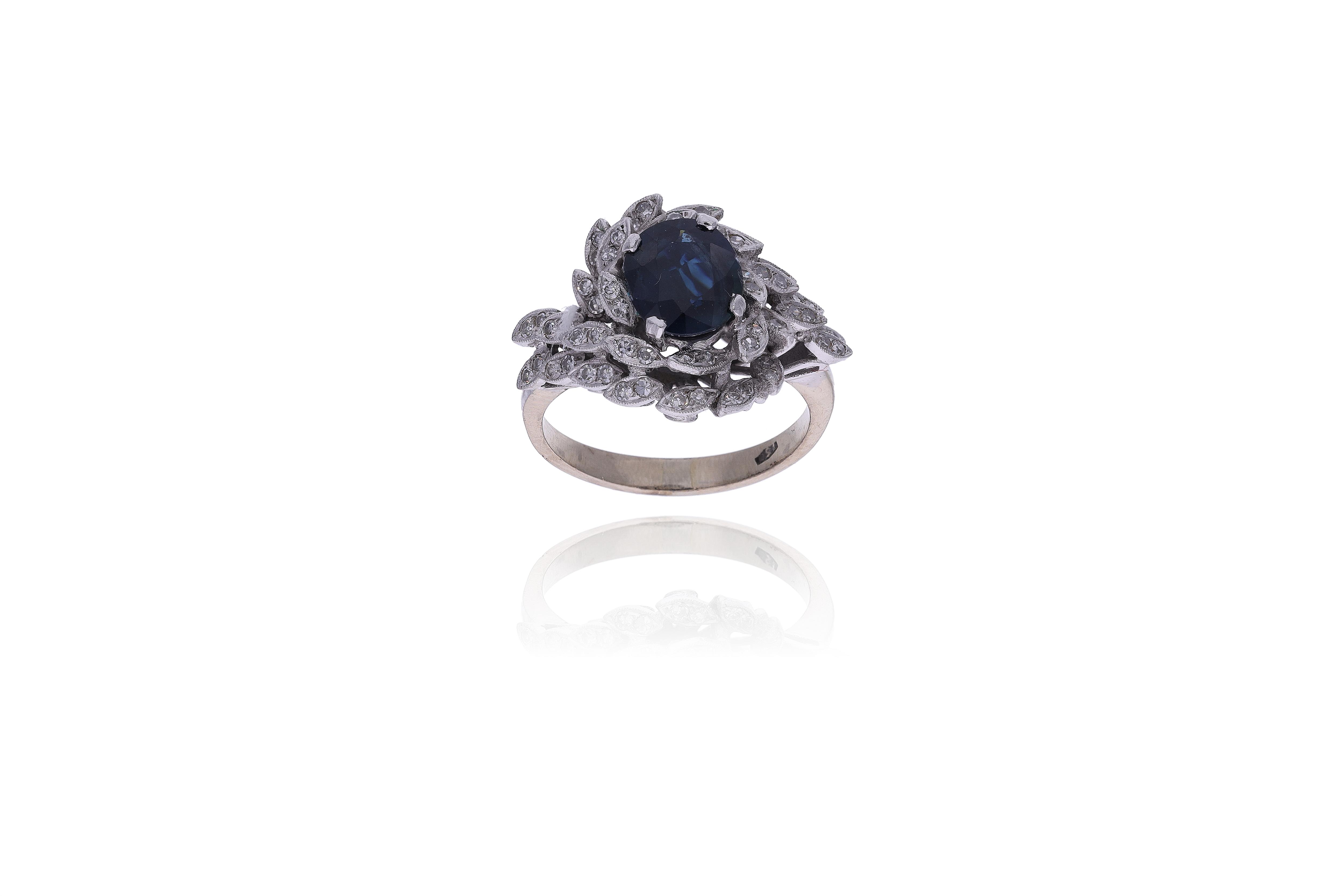 Anello con diamanti e zaffiro - Asta Preziosi