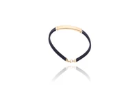 Bracciale in caucciu' e oro - Asta Preziosi