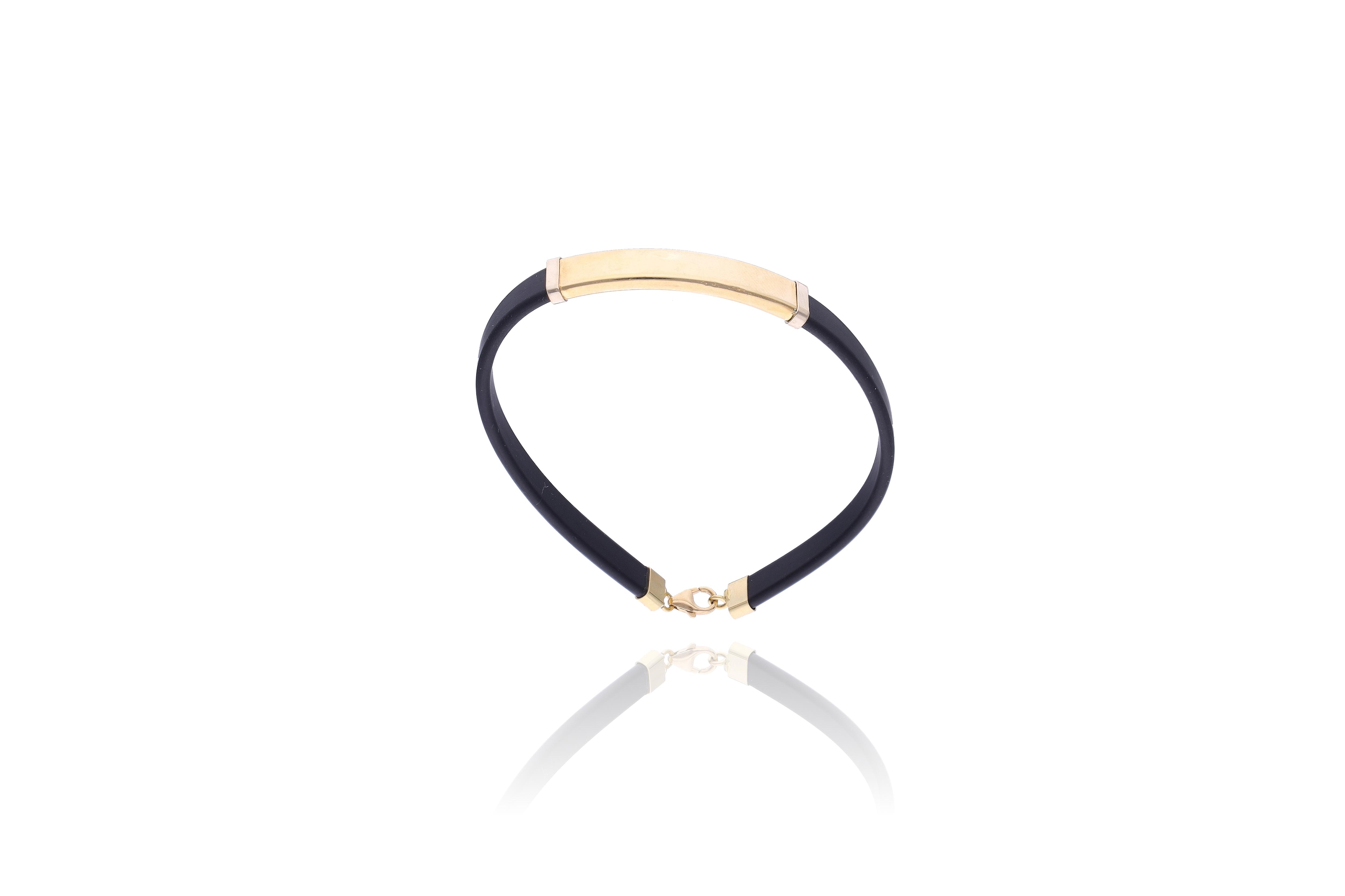 Bracciale in caucciu' e oro - Asta Preziosi