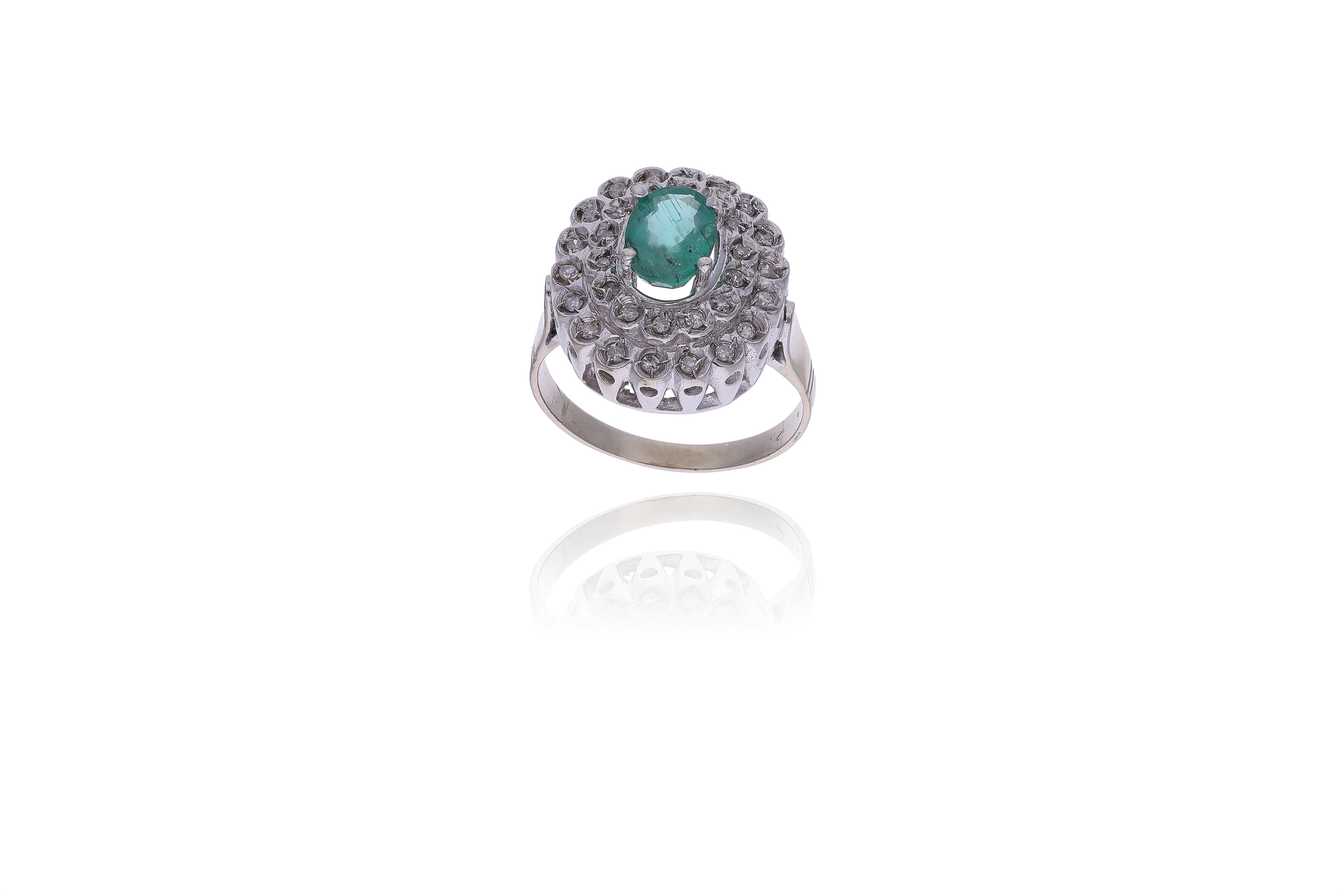 Anello con smeraldo e diamanti - Asta Preziosi Online