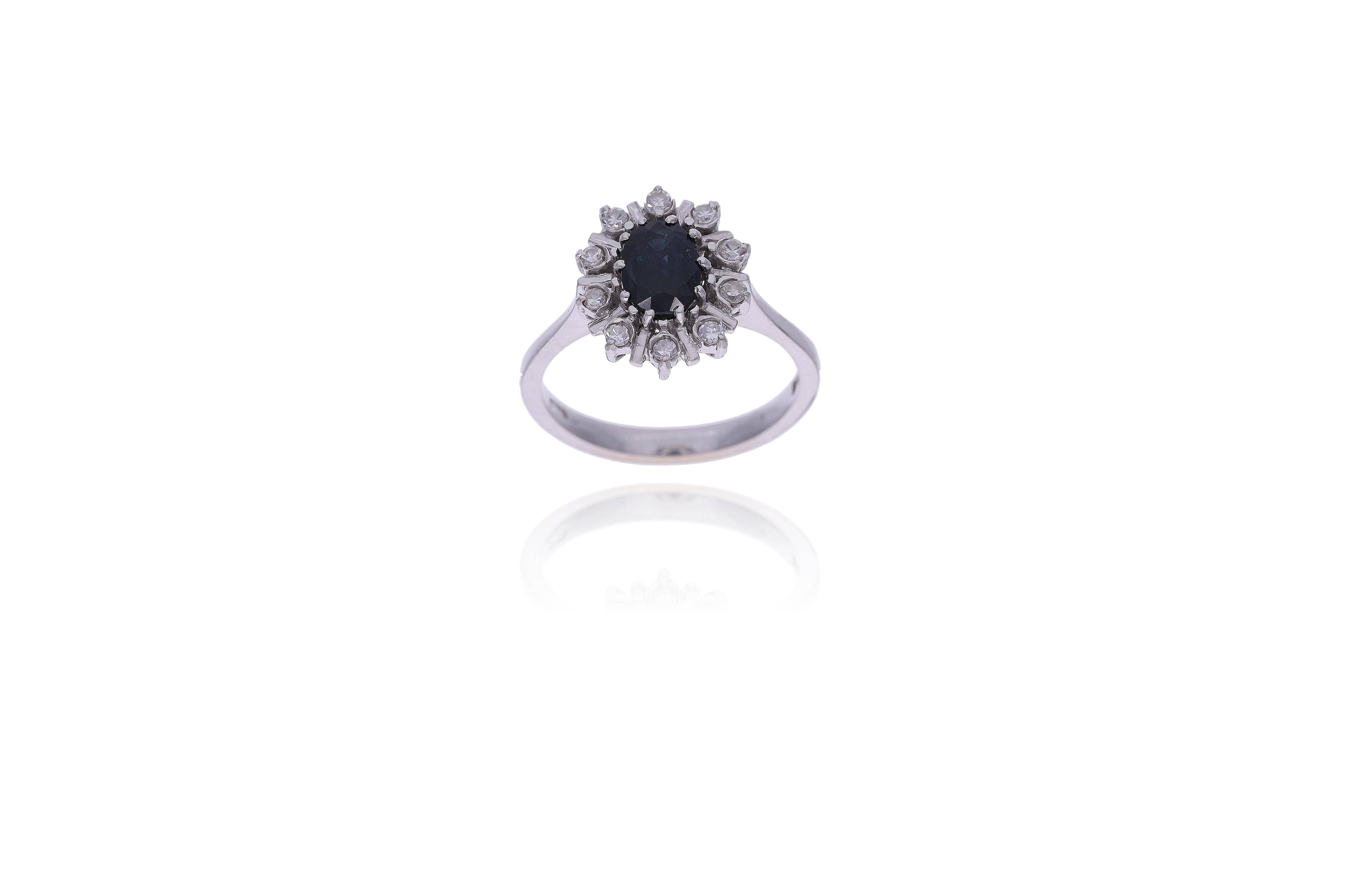 Anello con diamanti e zaffiro - Asta Preziosi Online