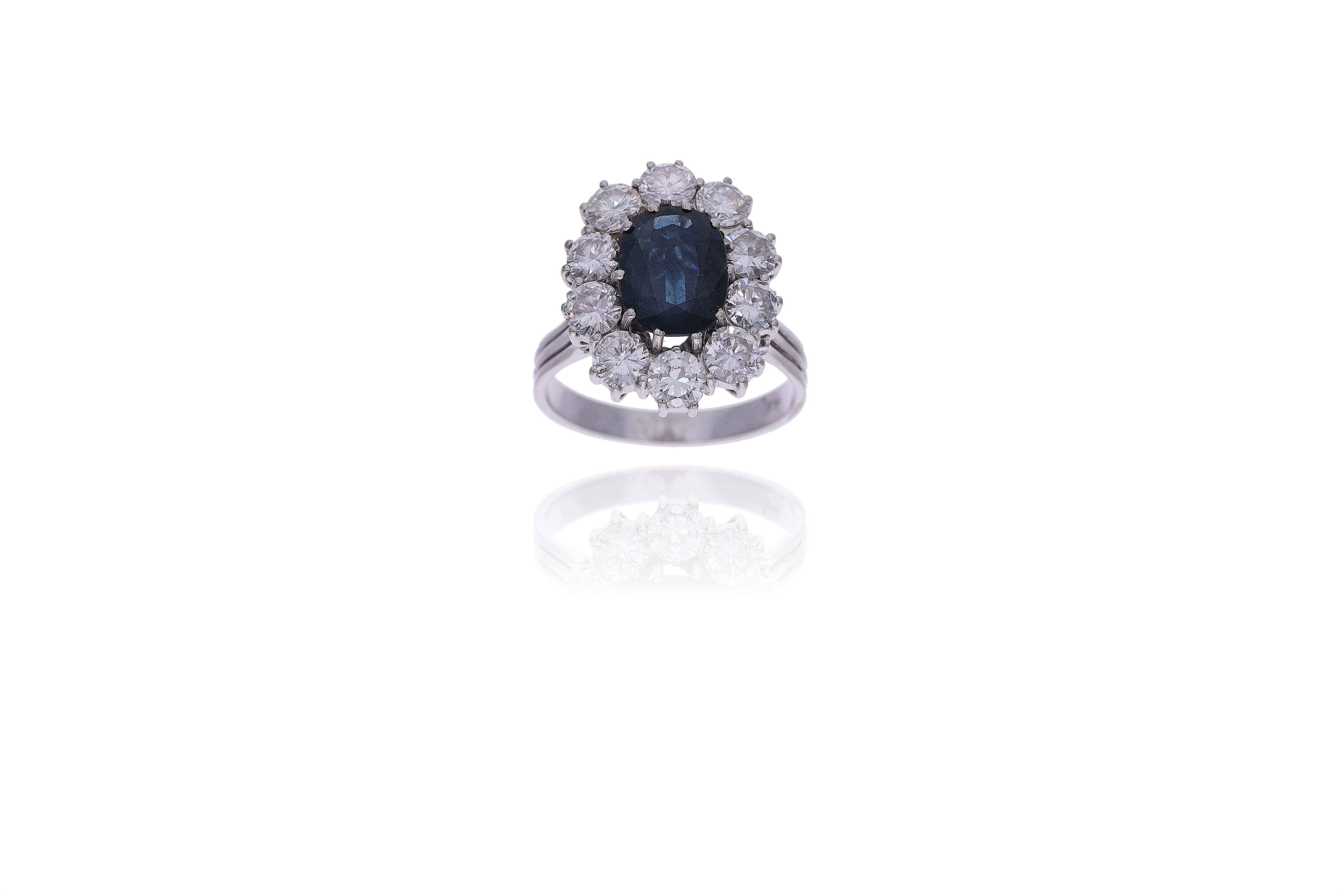 Anello con zaffiro e diamanti - Asta Preziosi Online