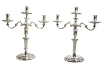 Sandonà candelabri in argento 800 - Asta Preziosi Online
