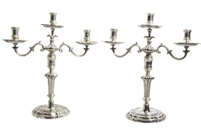 Sandonà candelabri in argento 800 - Asta Preziosi Online