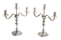 Coppia di candelieri in argento - Asta Preziosi Online