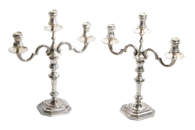 Coppia di candelieri in argento - Asta Preziosi Online