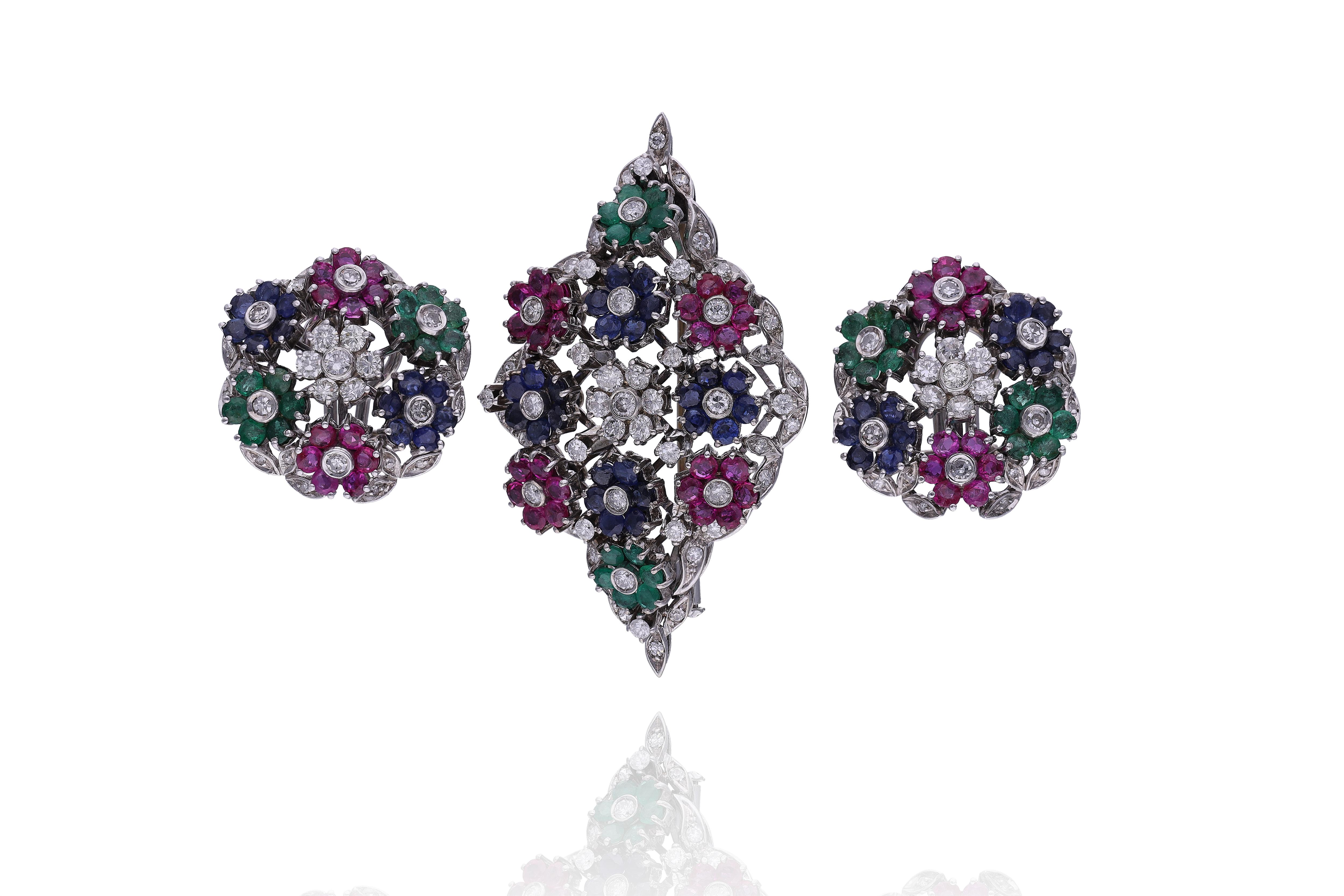 Parure con diamanti, rubini, zaffiri e smeraldi - Asta Preziosi Online