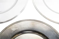 Tre sottopiatti in argento - Asta Preziosi Online
