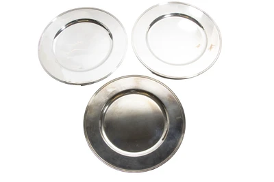 Tre sottopiatti in argento - Asta Preziosi Online