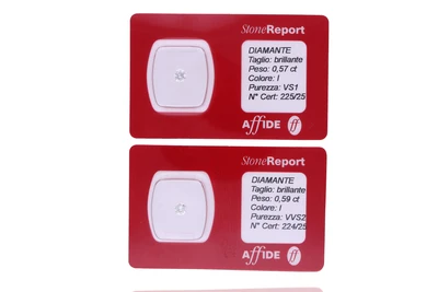 Due diamanti taglio brillante, ct 0,59 e ct 0,57 - Asta Preziosi Online