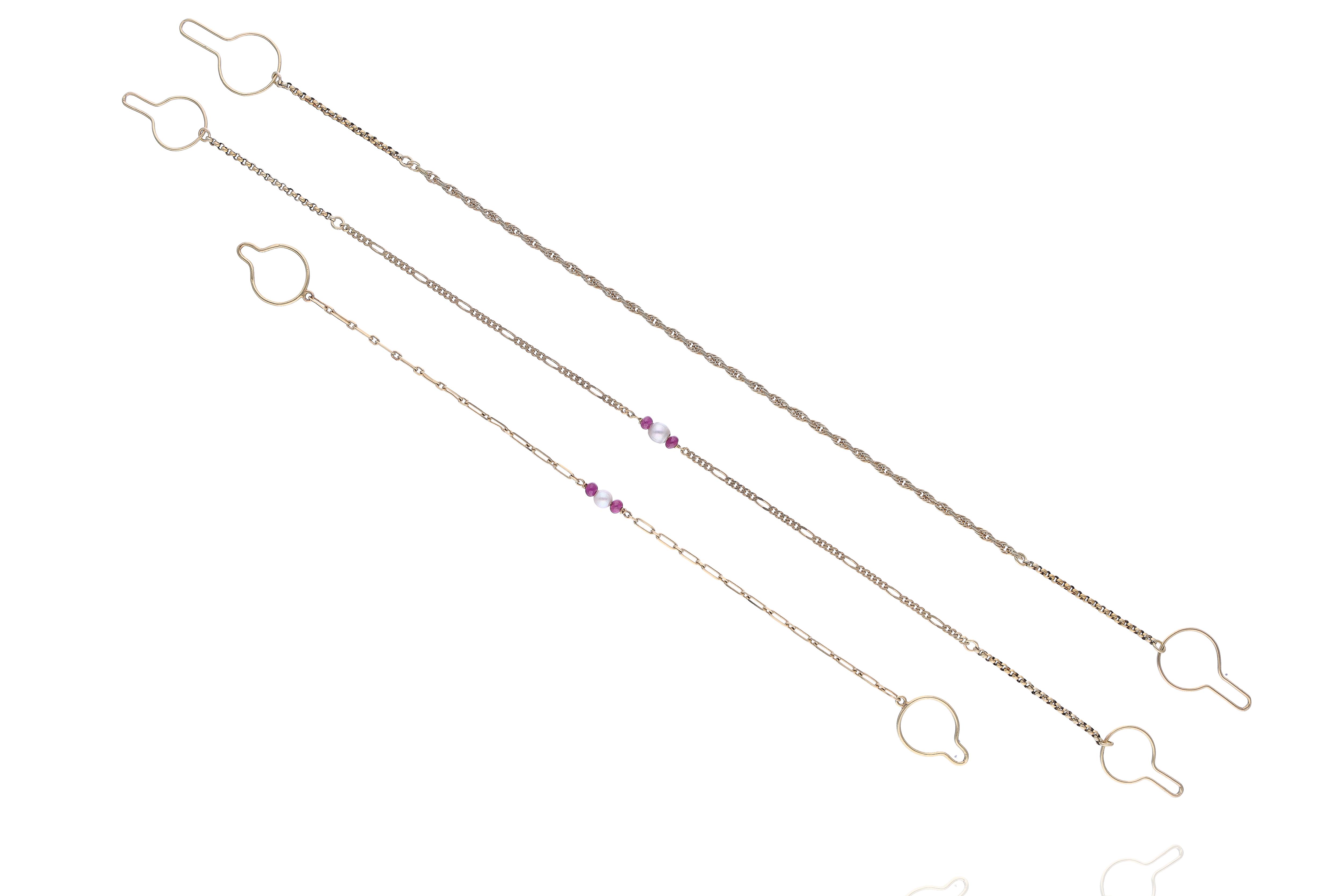 Tre ferma gilet con perle coltivate e rubini - Asta Preziosi Online