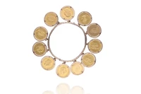 Bracciale con monete e medaglia - Asta Preziosi